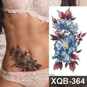 Colorful Flowers Among Other Tattoos