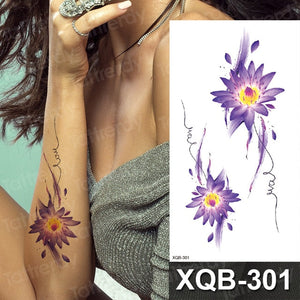 Colorful Flowers Among Other Tattoos